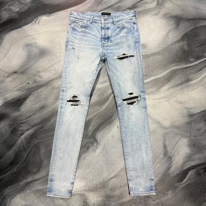 Amiri Light Blue/Black Patch Jean (34)