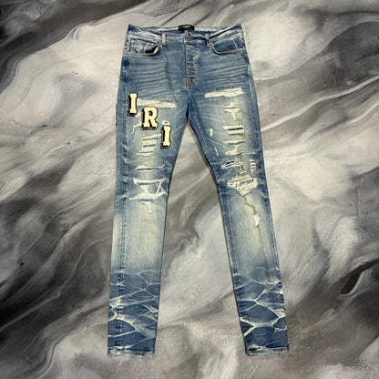 Amiri Dark Blue/Collegiate Logo Patch Jean (36)