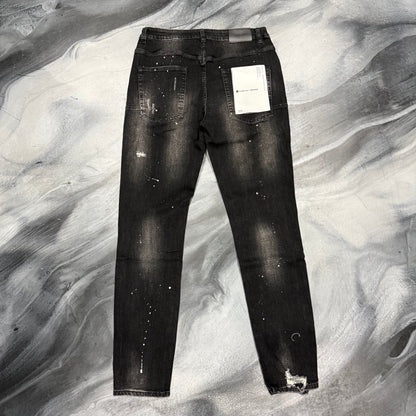 Purple Brand Black Distressed Orange Paint Splatter Jean